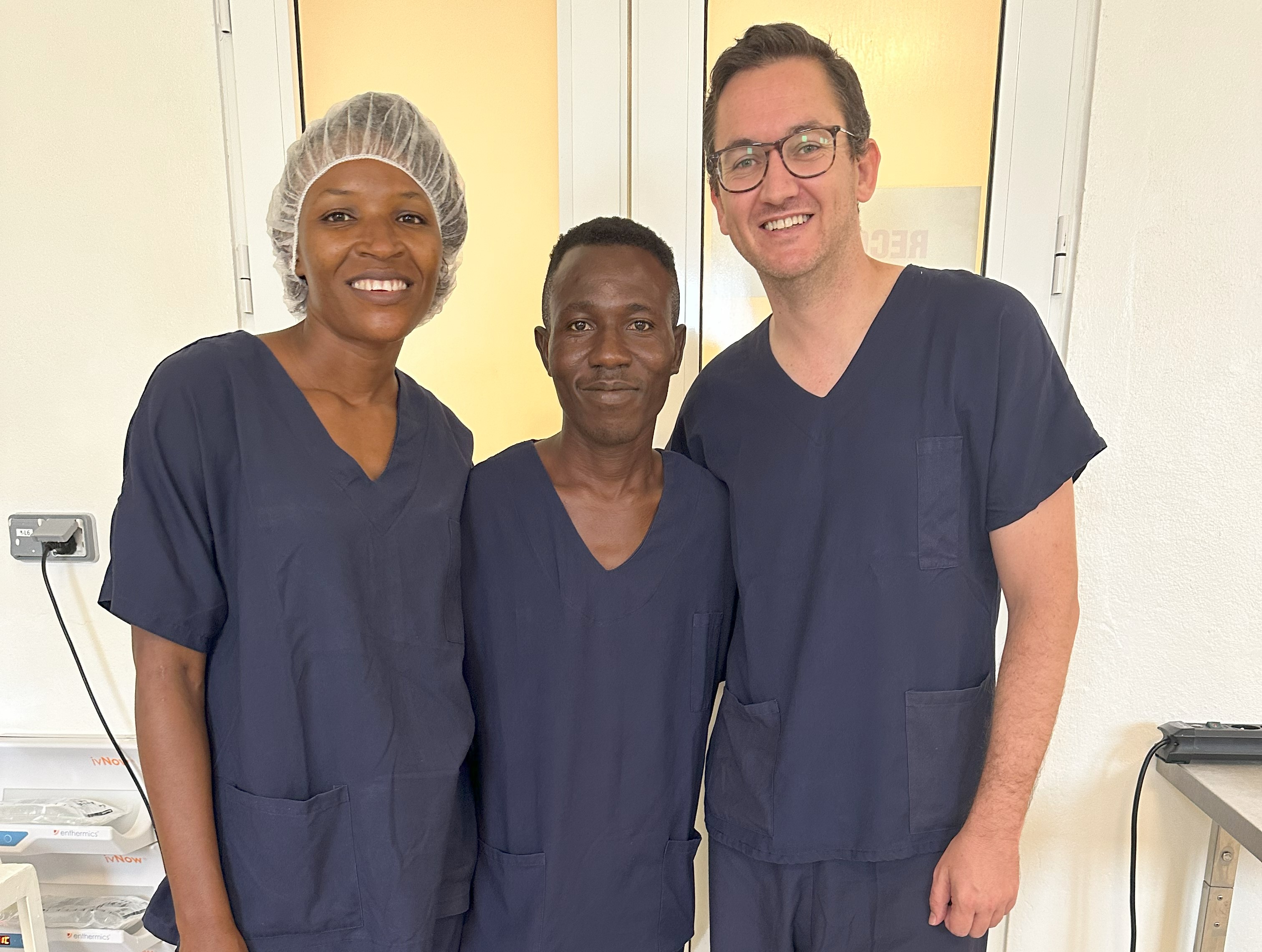 Obstetrician-gynaecologist Jared Watts with colleagues on assignment.