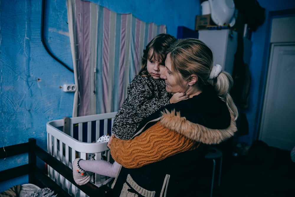 Yuliia with her grand-daughter