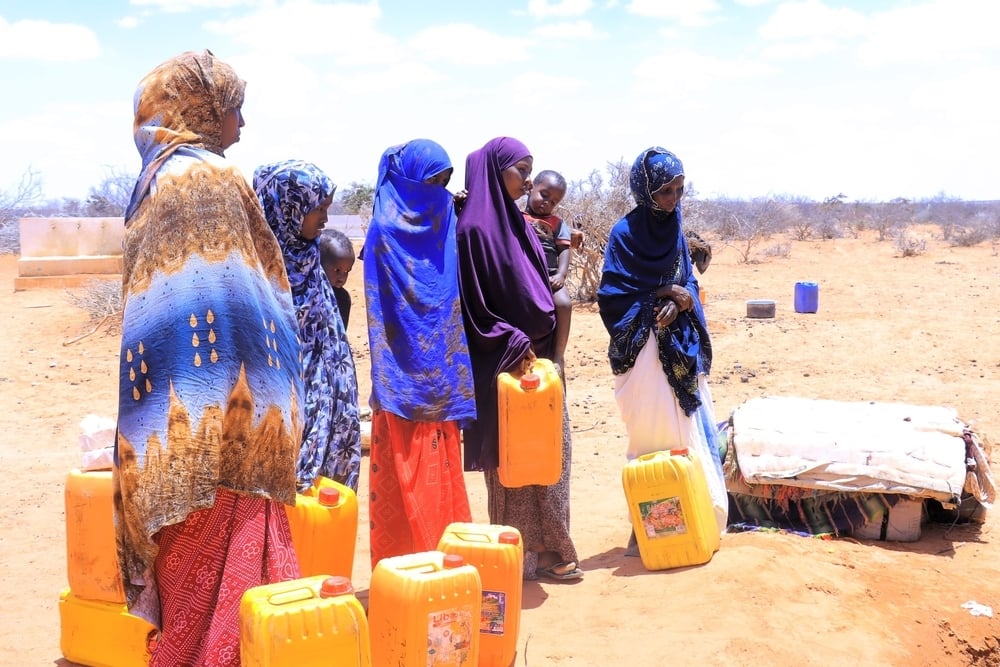  Women waiting to collect water in Somalia