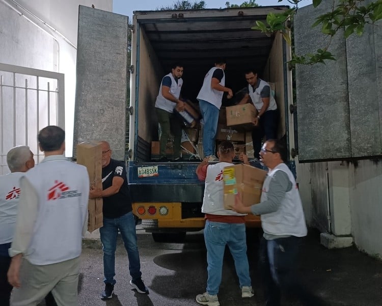 MSF teams loading medical supplies