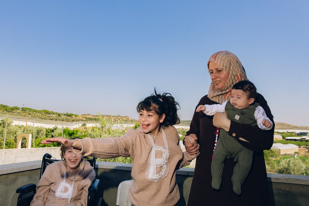 Rana with three of her children