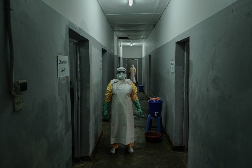 Workers inside an Ebola isolation centre