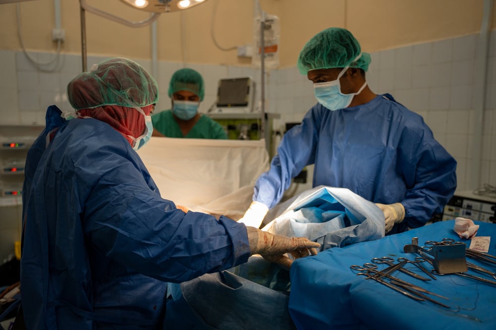 Doctors perform a caesarean section