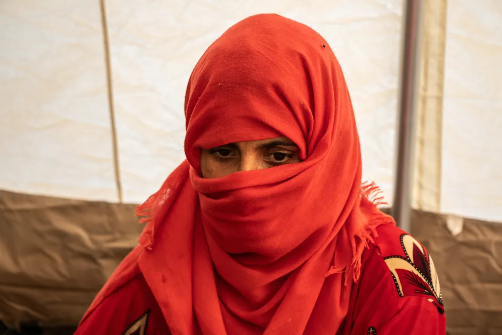 Patient in  one of the MSF tents 