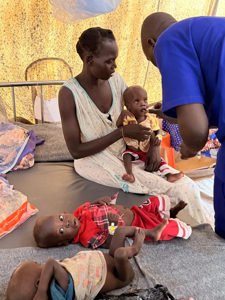 Akon with her triplets