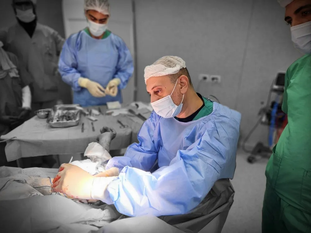 MSF staff operating on a patient