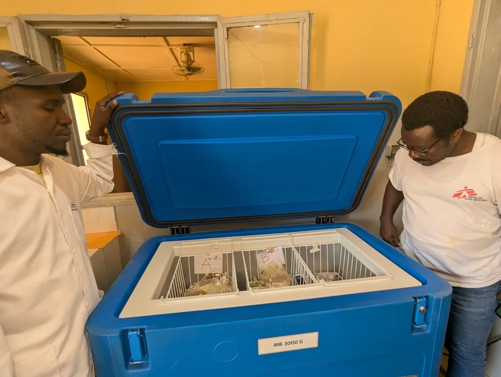 Moise Kitété and Maiga are inspecting the blood bank at the Douentza laboratory