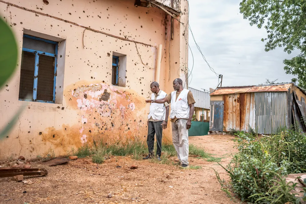 Staff inspect the damage to Nyala Teaching Hospital