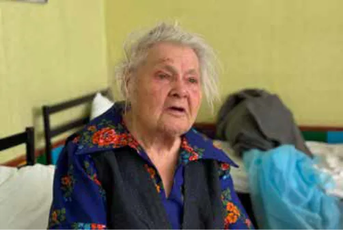 Elderly displaced woman