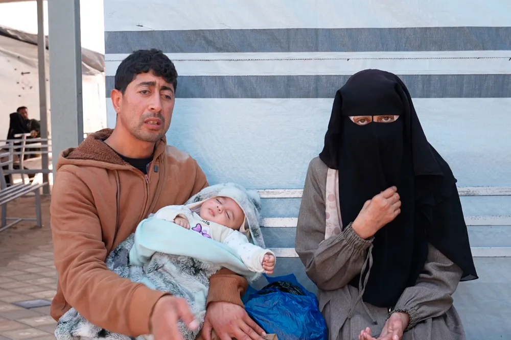 Samar with her husband and baby