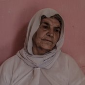 Halo Khalaf, 66, poses in her house in Sinuni. © Emilienne Malfatto / MSF