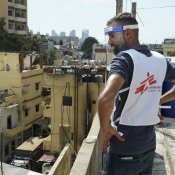 An MSF team member looks over the neighbourhood of Karantina, east of the Port of Beirut, during door-to-door activities. © Mohamad Cheblak/MSF