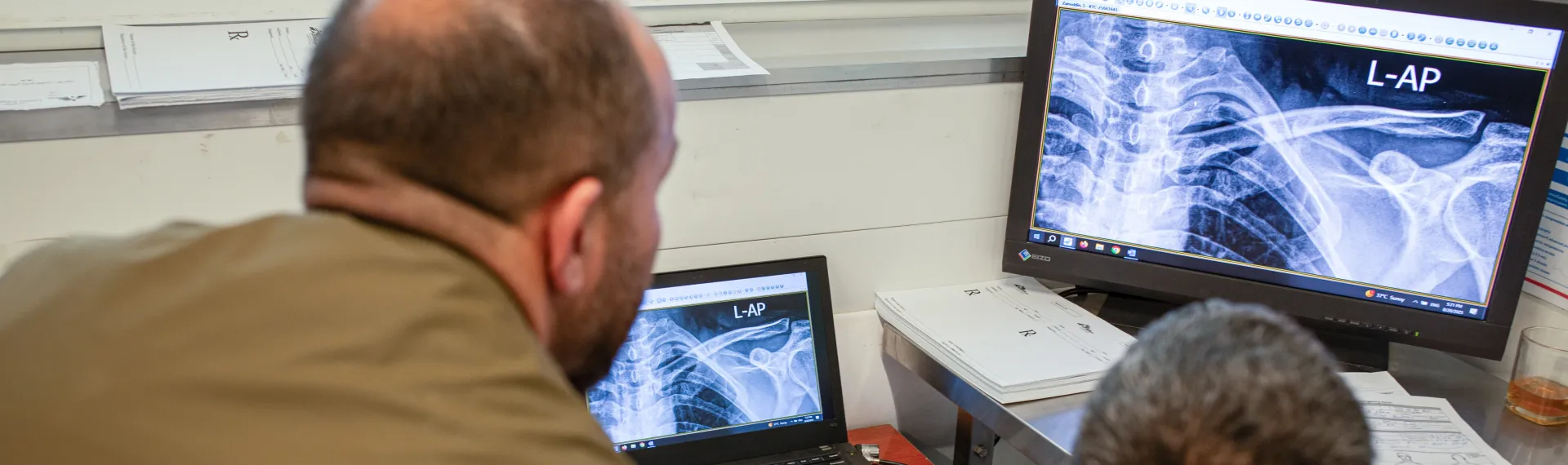 Doctors examining x-rays