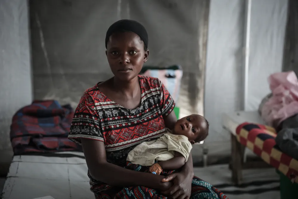 Louange Uwizeye with her son